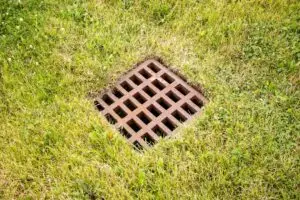 buried downspout drain pop-up emitter lawn roof runoff foundation